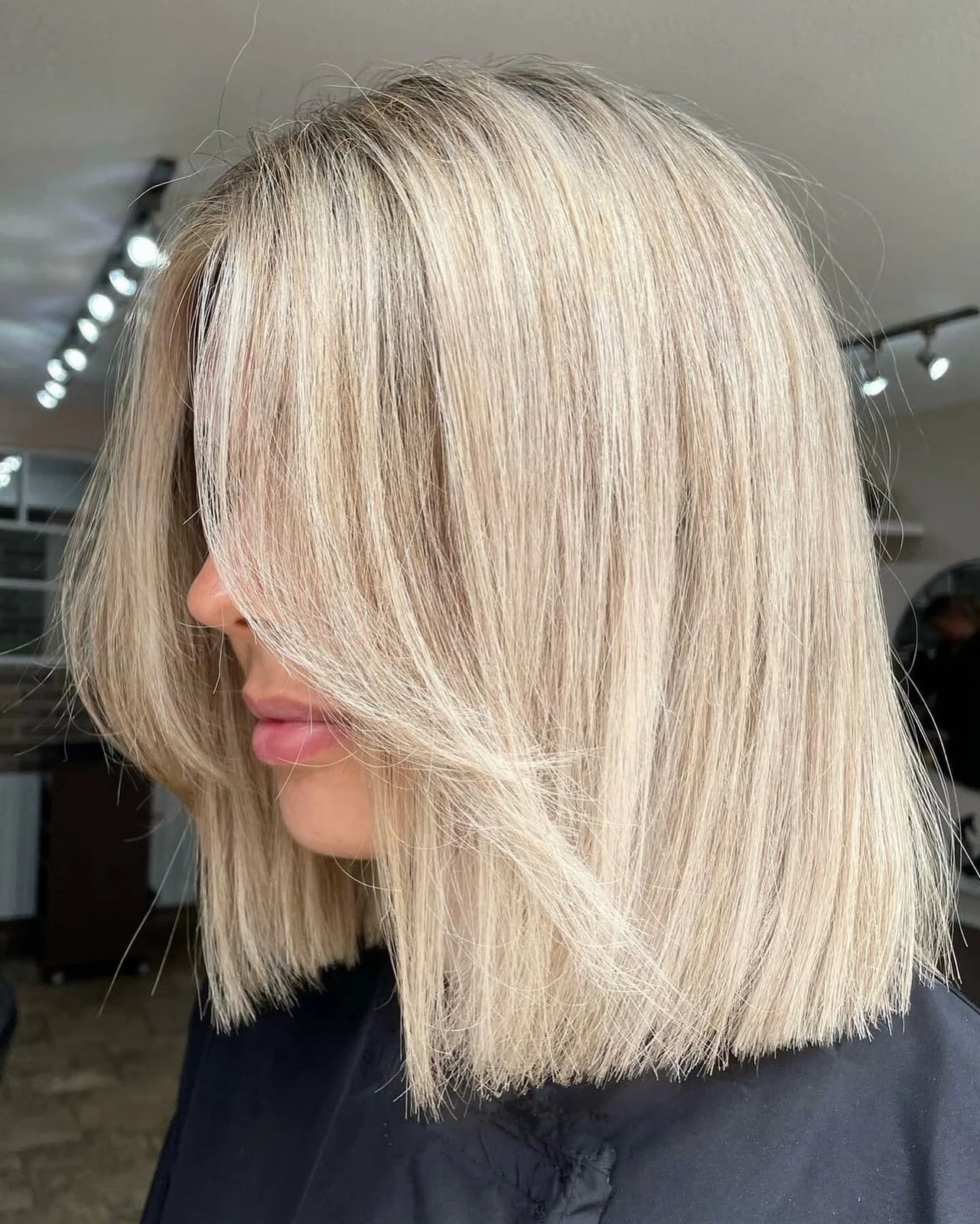 Ash Blonde Bob With Curtain Bangs Side View — Classy Bob Hair