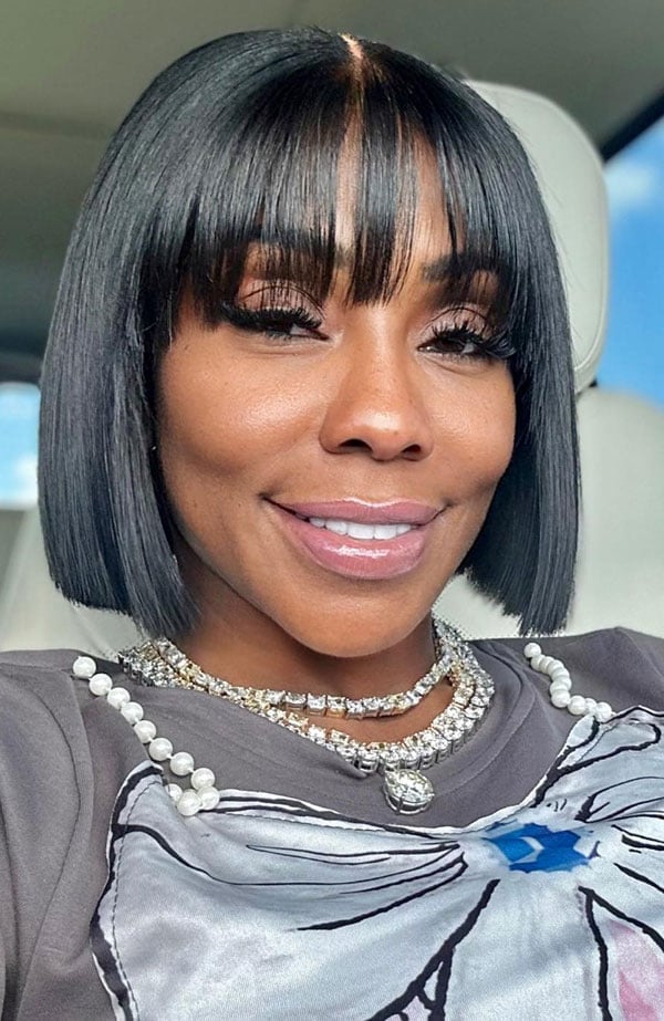 Sleek Black Blunt Bob With Wispy Bangs Sleek Black Blunt Bob With Wispy Bangs — Classy Bob Haircuts with Bangs