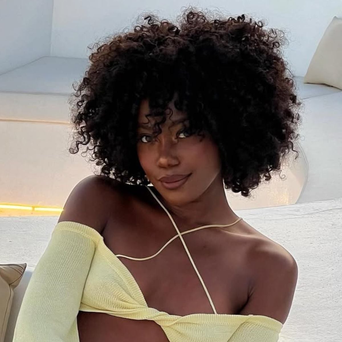 Voluminous Black Bob With Coily Curls Voluminous Black Bob With Coily Curls — Classy Bob with Curls