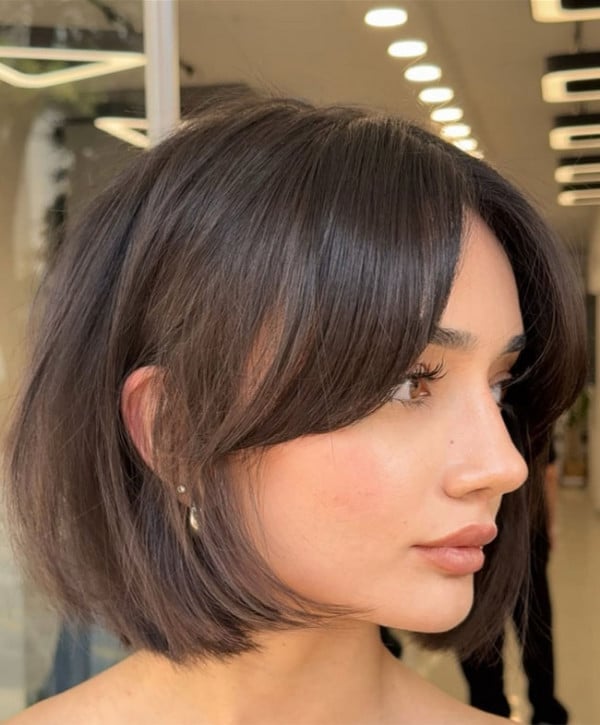 Chin Length Bob With Well Defined Curtain Bangs And Side Part Chin Length Bob With Well Defined Curtain Bangs And Side Part — Classy Bob with Curtain Bangs