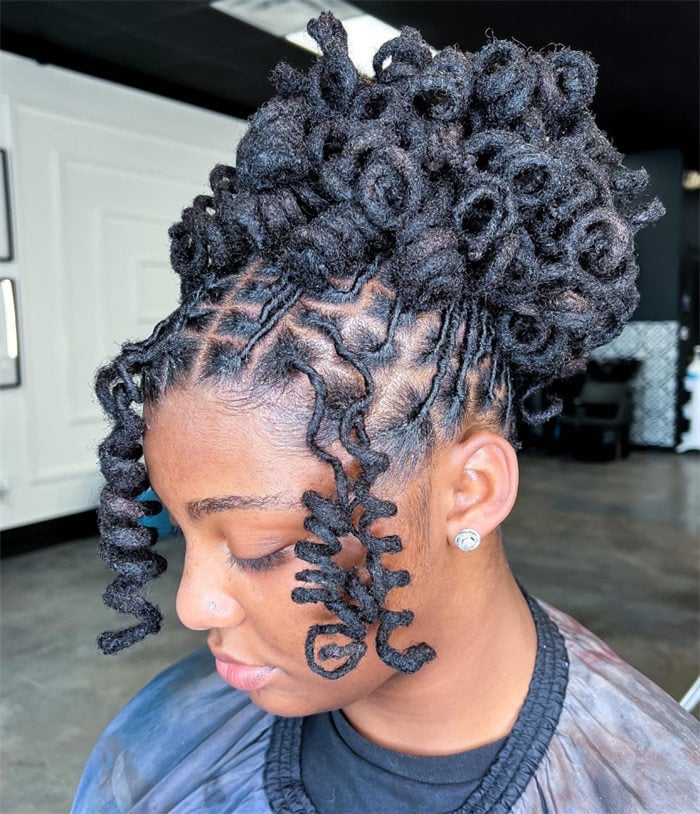 Updo With Sculptural Coiled Locs And Loose Tendrils Updo With Sculptural Coiled Locs And Loose Tendrils — Classy Braids Locs