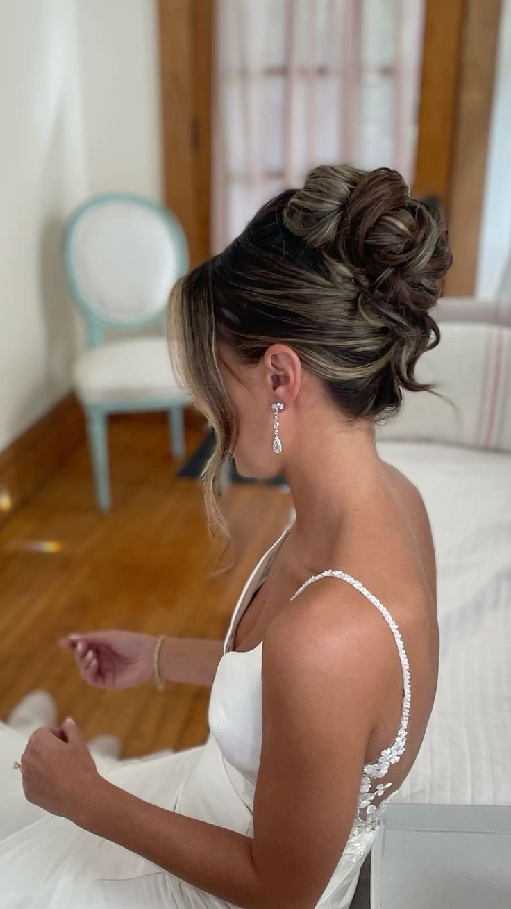 Brown High Bun With Face-Framing Pieces Brown High Bun With Face-Framing Pieces — Classy Bridal Bun