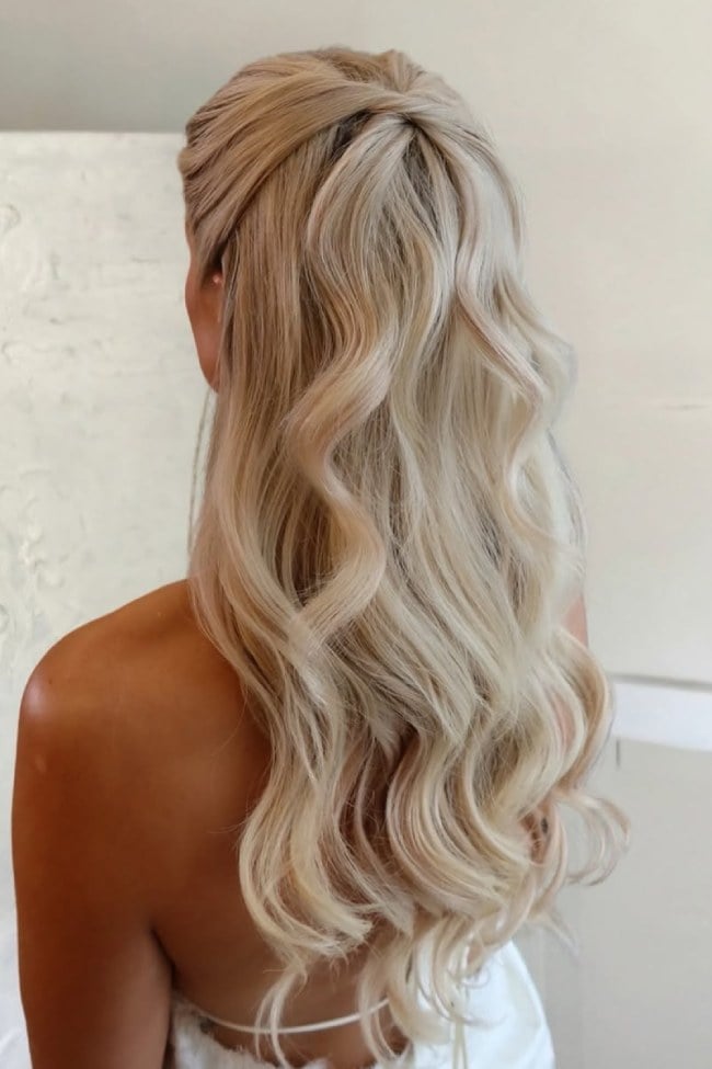 Mid-Back Creamy Blonde Waves With Twisted Knot — Classy Bridesmaid Hairstyles Half Up