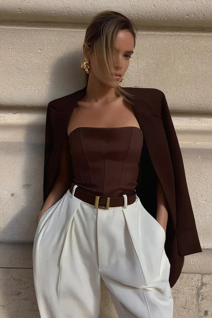 Brown Blazer Draped Over White Trousers and Corset, Close-Up Take Brown Blazer Draped Over White Trousers and Corset, Close-Up Take — Classy Brown Outfits