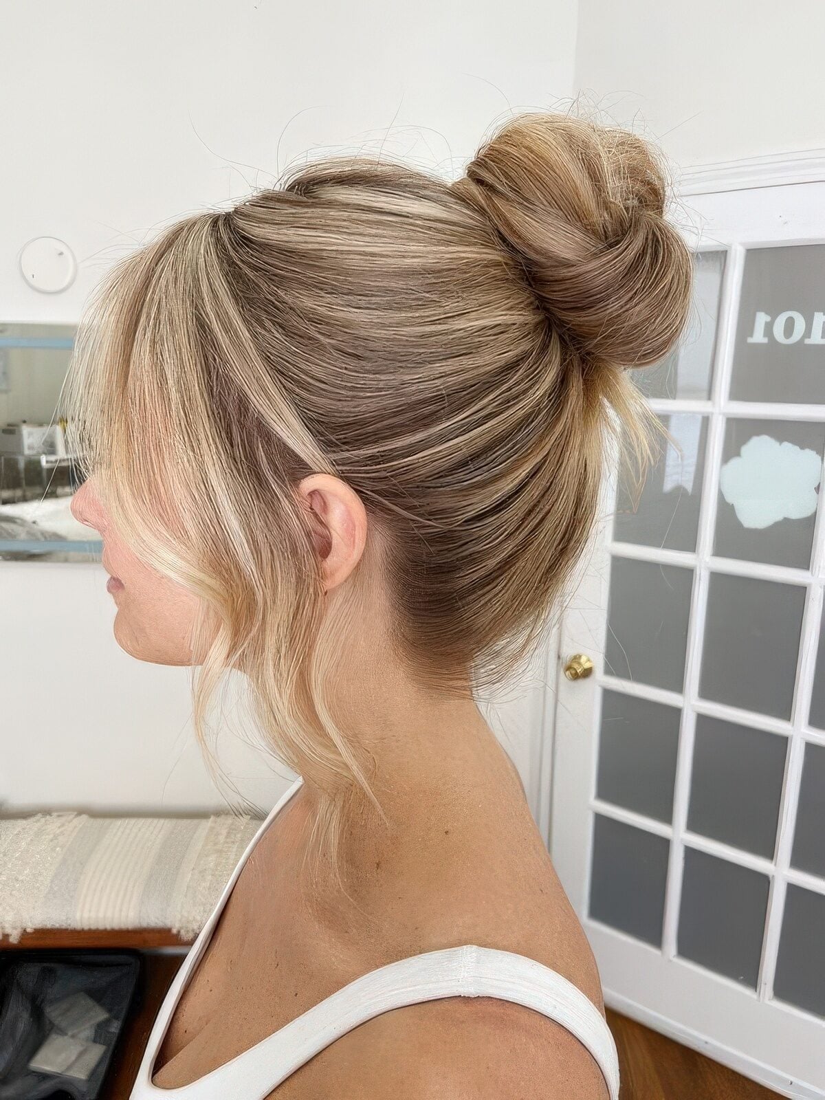 Loose Bun With Wispy Bangs Blonde, Close-Up Take — Classy Bun and Bang