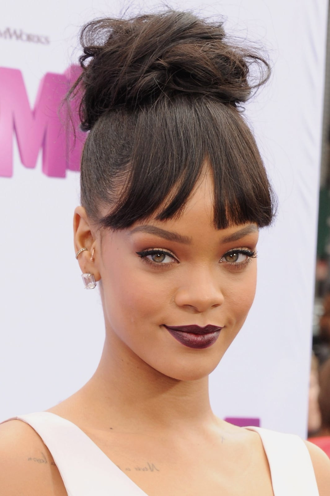 High Messy Bun With Blunt Bangs and Dark Brown With Subtle Highlights — Classy Bun and Bang