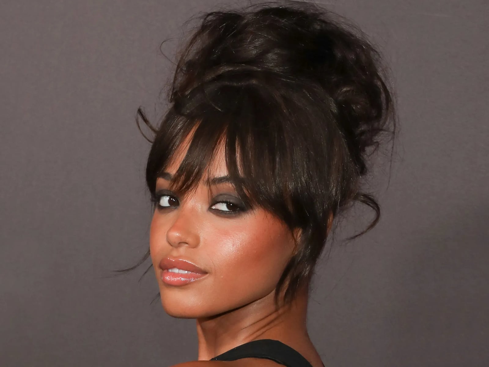 Voluminous High Bun With Full Bangs — Classy Bun and Bang