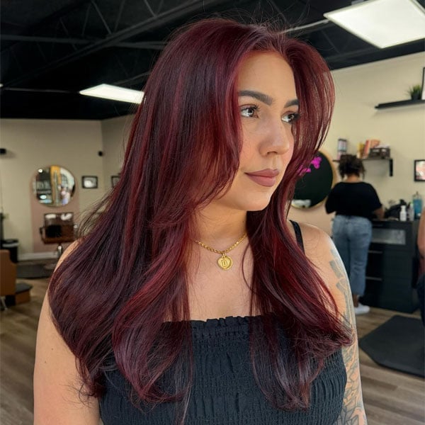 Collarbone Layers With Soft Waves — Classy Burgundy Highlights