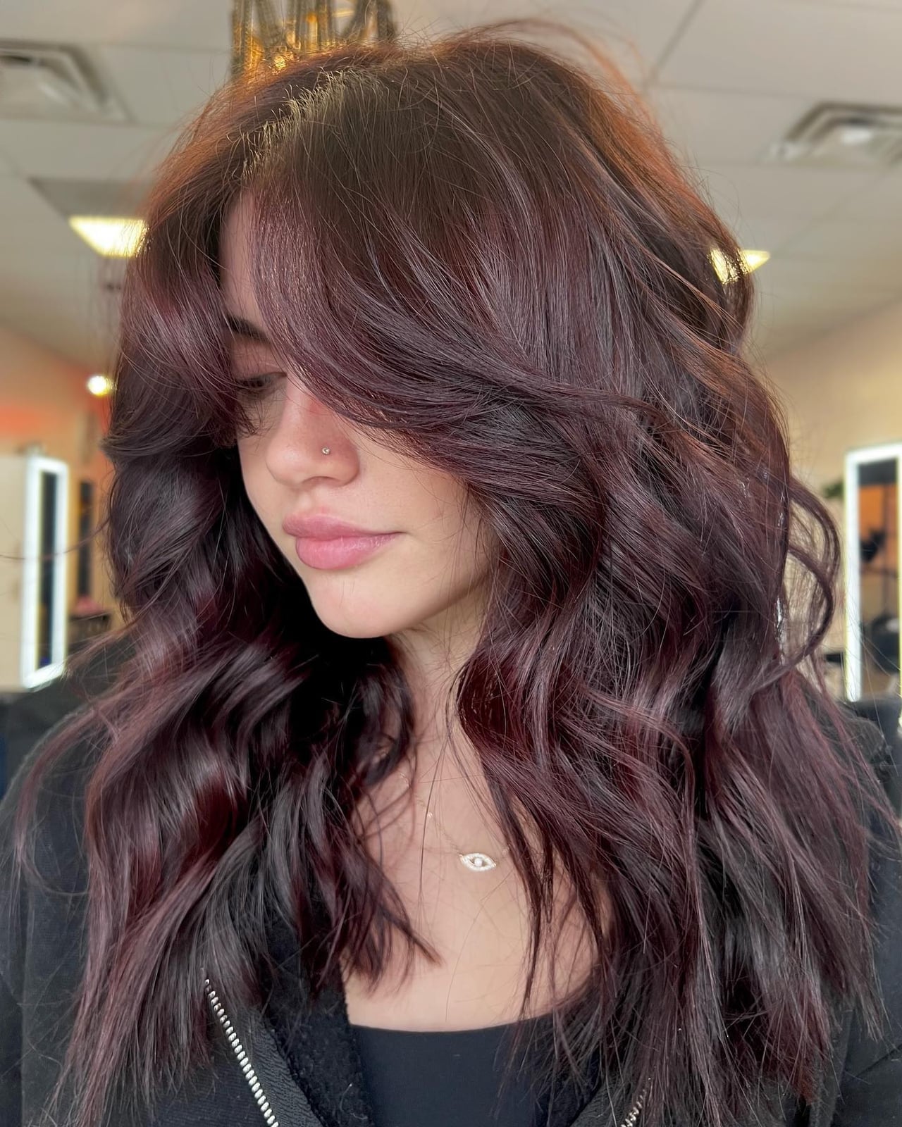 Thick Wavy Mid-Back Blowout With Curtain Bangs, Middle — Classy Burgundy Highlights