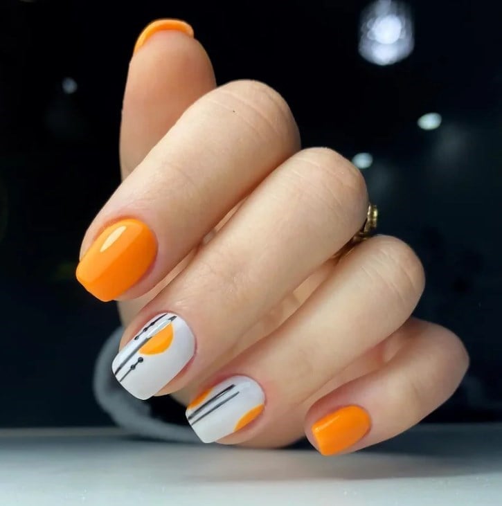 Graphic Abstract Short Almond Orange and Black Nails Graphic Abstract Short Almond Orange and Black Nails — Classy Burnt Orange Nails