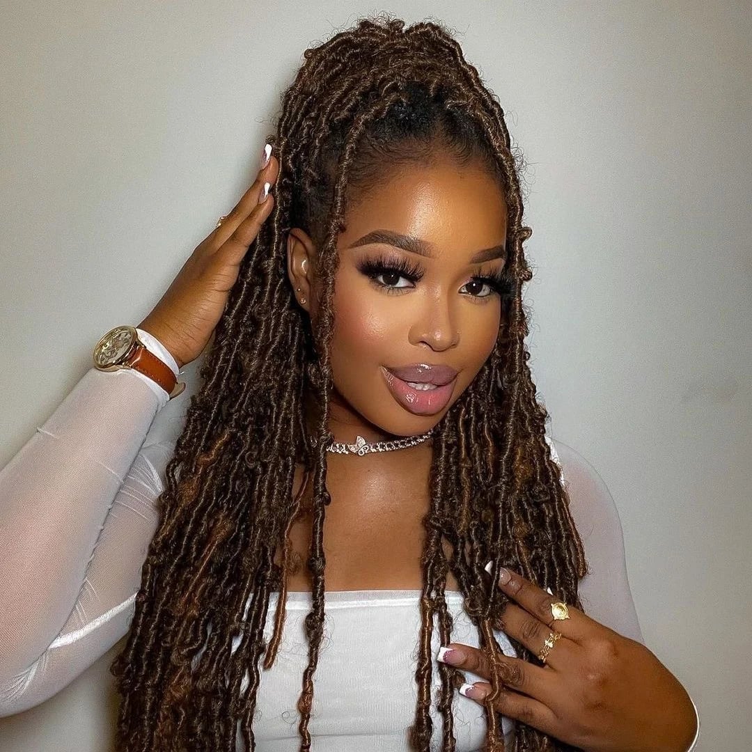 Mid-Back Wavy Locs In A High Ponytail — Classy Butterfly Locs