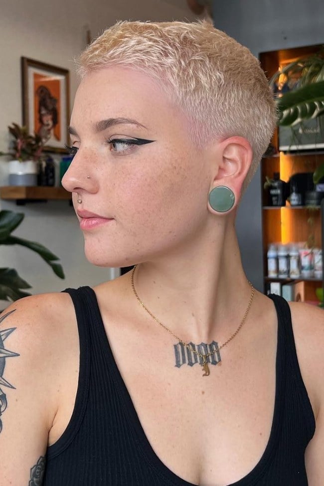 Platinum Buzz Cut With Green Earrings Platinum Buzz Cut With Green Earrings — Classy Buzz Cut