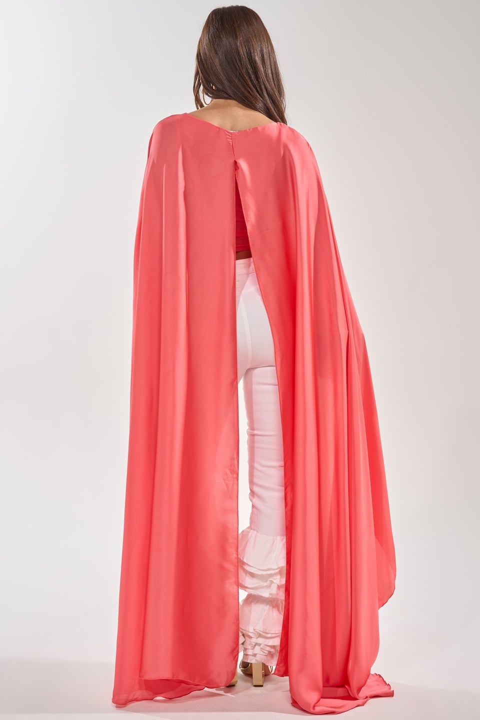 Coral Cape With Dramatic Split Over Ruffled Pants Coral Cape With Dramatic Split Over Ruffled Pants — Classy Cape Outfits