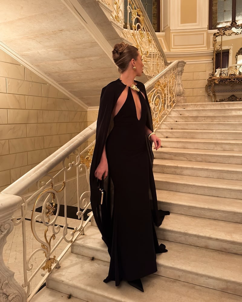 Black Formal Dress With Attached Cape and Keyhole, Close-Up Take Black Formal Dress With Attached Cape and Keyhole, Close-Up Take — Classy Cape Outfits
