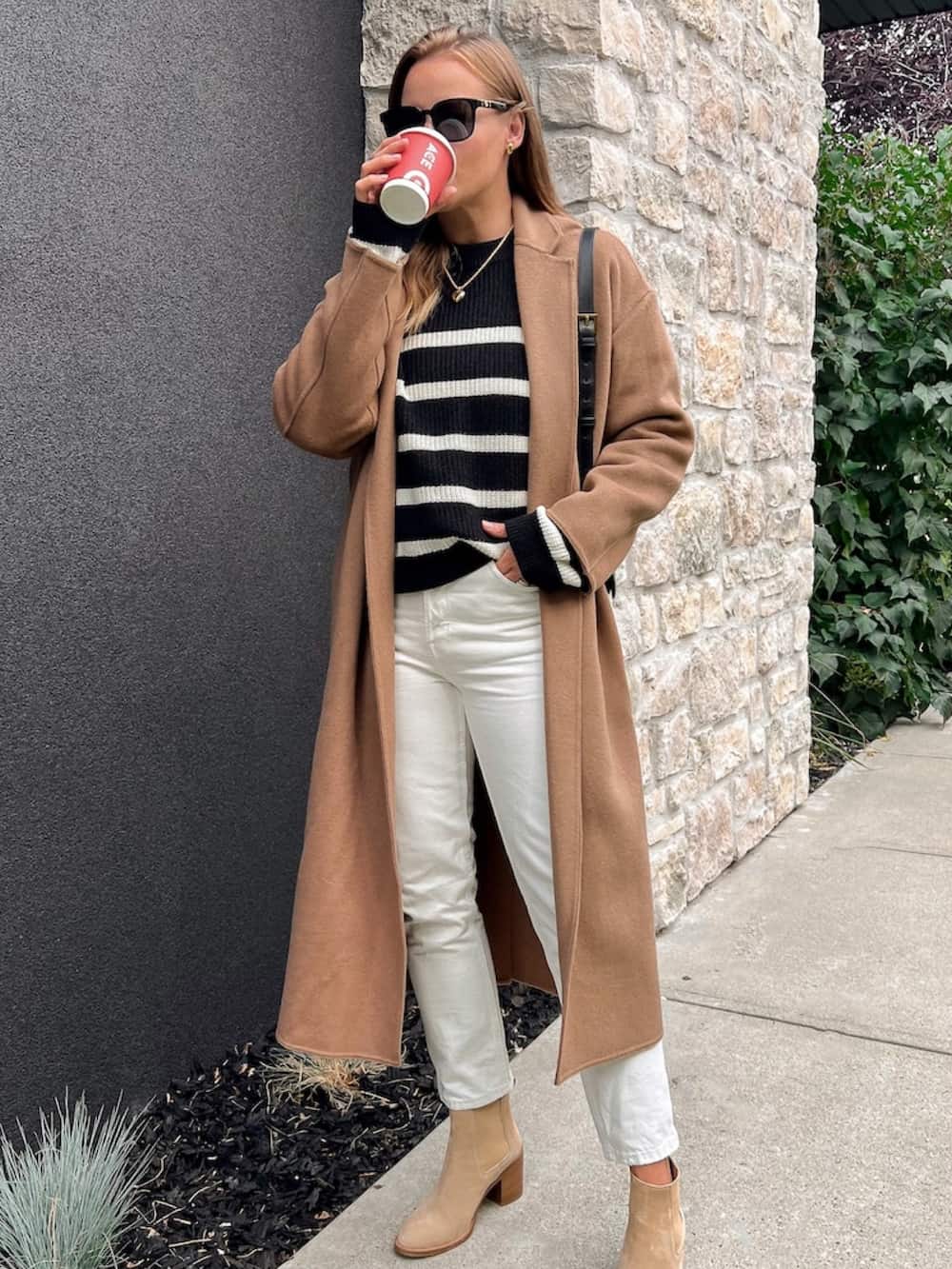Long Camel Coat Over Striped Sweater and White Jeans Long Camel Coat Over Striped Sweater and White Jeans — Classy Casual Date Night Outfit