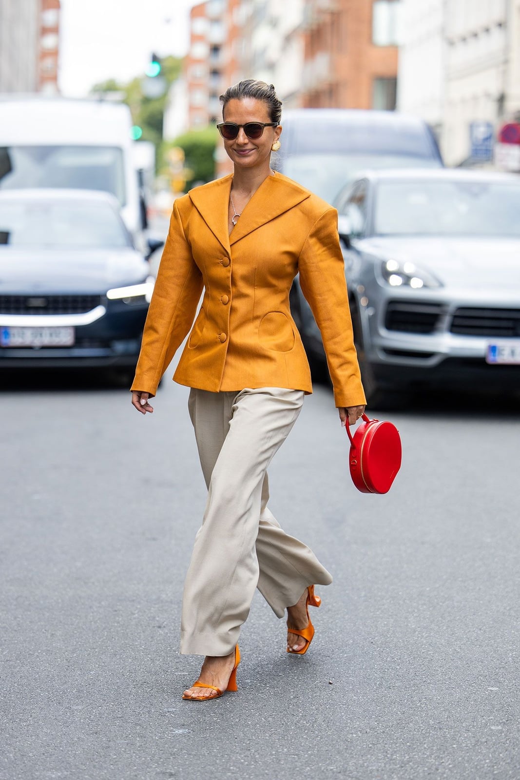 Structured Orange Blazer Over Beige Wide-Leg Trousers Structured Orange Blazer Over Beige Wide-Leg Trousers — Classy Casual Date Night Outfit