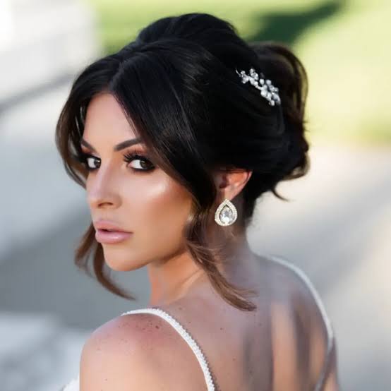 Voluminous Dark Brown Updo With Soft Waves Voluminous Dark Brown Updo With Soft Waves — Classy Casual Updo