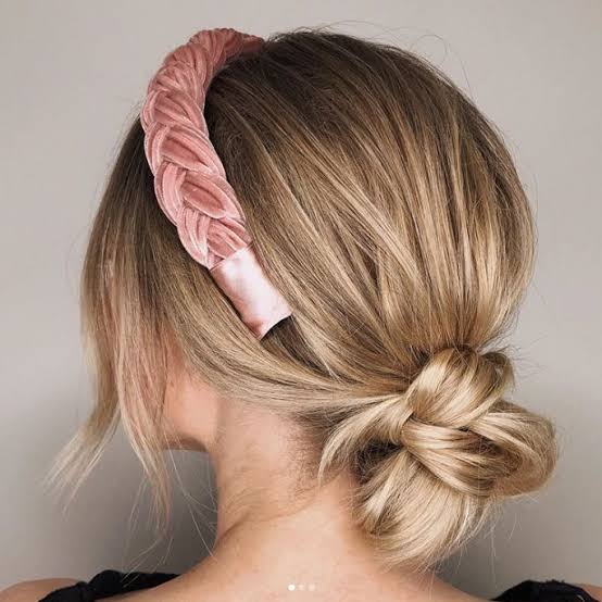 Messy Curly Black Top Knot With Wispy Bangs Messy Curly Black Top Knot With Wispy Bangs — Classy Casual Updo