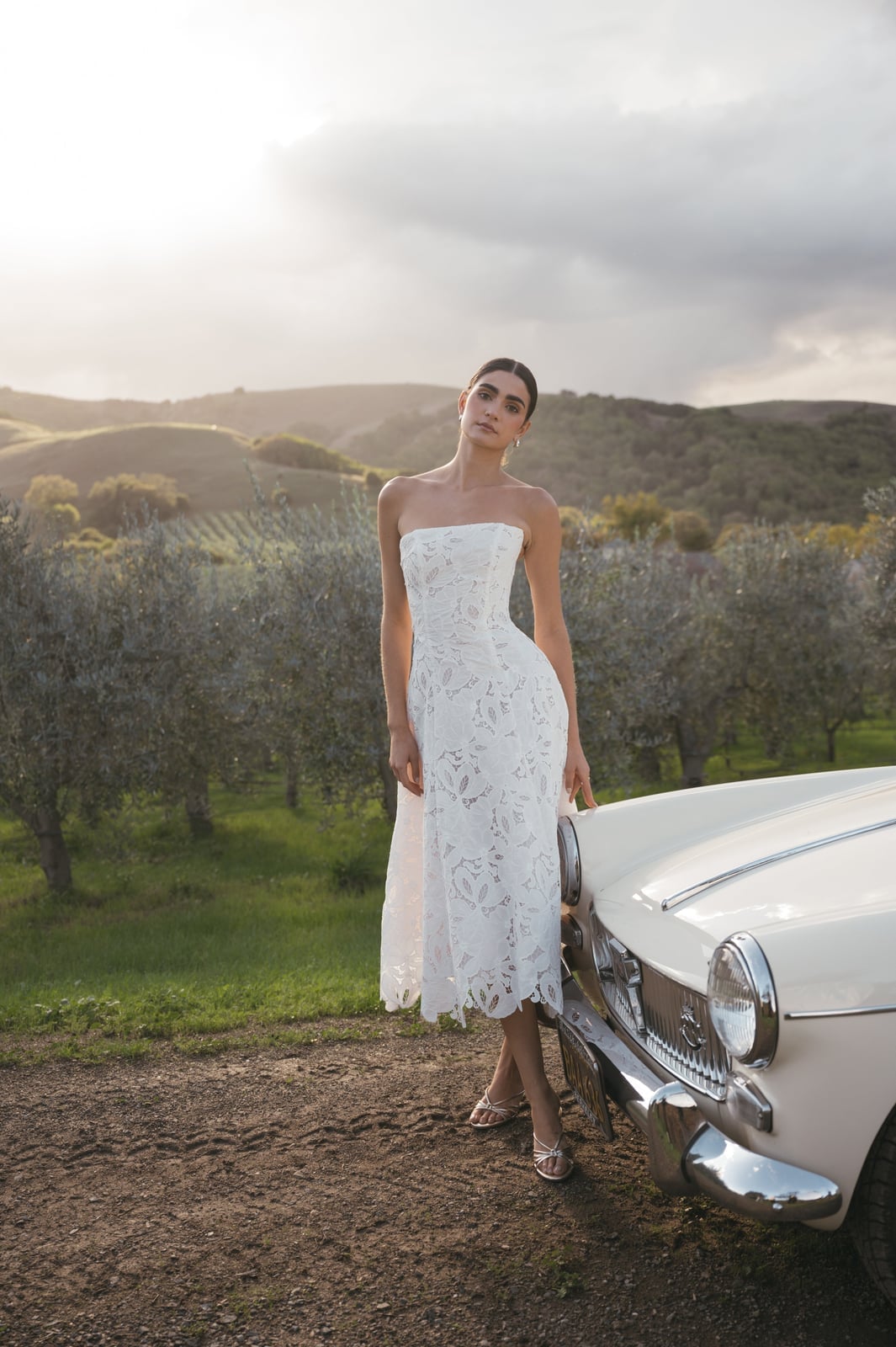 Strapless White Lace Midi Dress with Intricate Overlay Strapless White Lace Midi Dress with Intricate Overlay — Classy Cocktail Dresses Wedding