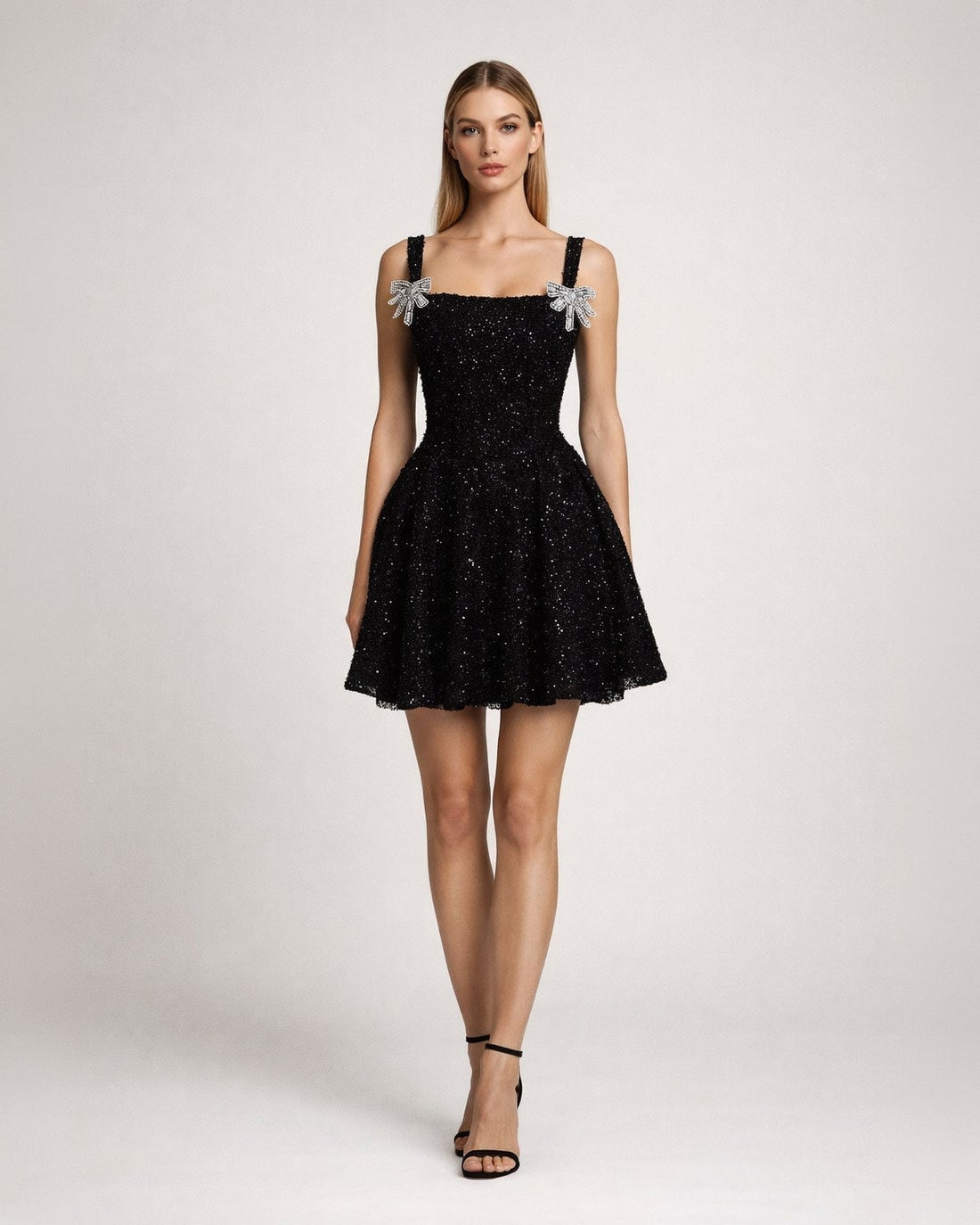 Black Textured Sequined Mini Dress with Bow Straps Black Textured Sequined Mini Dress with Bow Straps — Classy Cocktail Party Outfits
