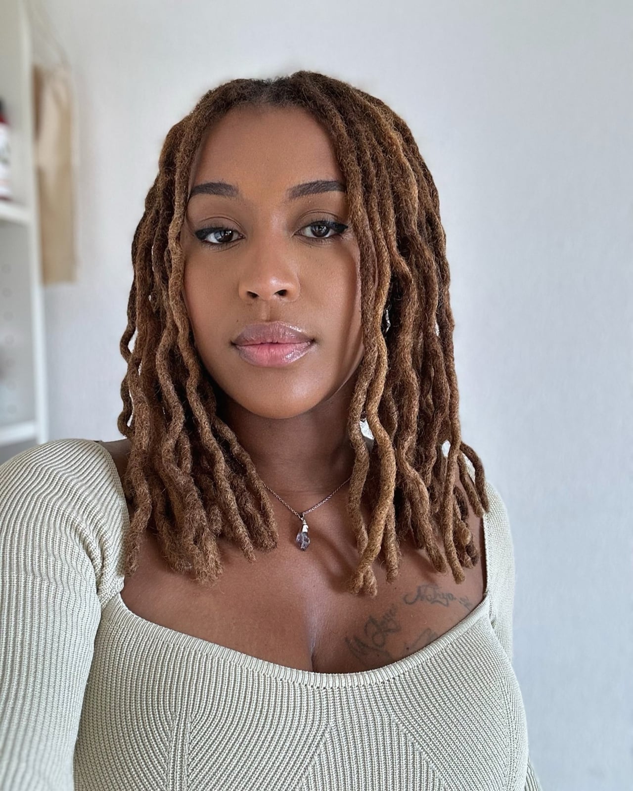 Collarbone Locs With Warm Caramel Highlights Collarbone Locs With Warm Caramel Highlights — Classy Color Locs