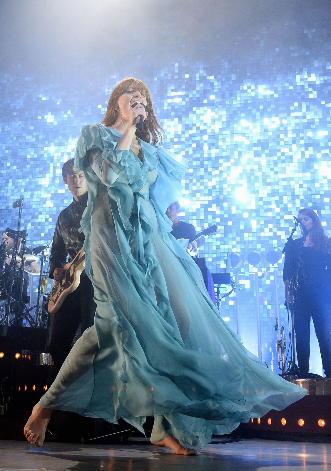 Pale Blue Ruffled Sheer Flowing Concert Gown Pale Blue Ruffled Sheer Flowing Concert Gown — Classy Concert Dresses