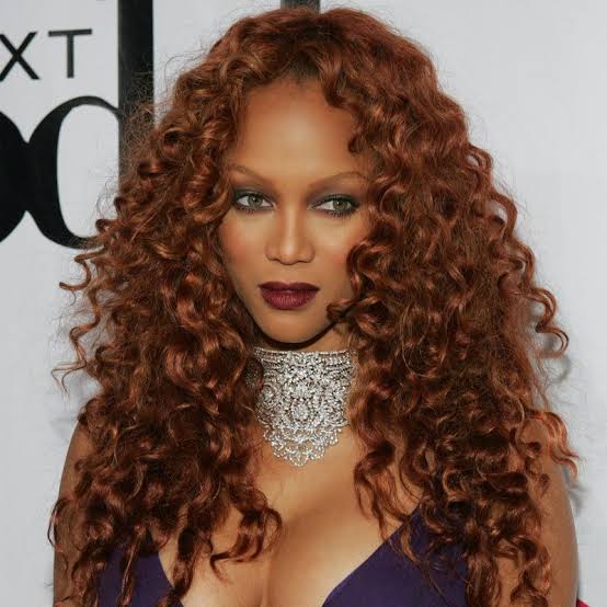 Mid-Back Wavy Hair with Side-Swept Bangs Mid-Back Wavy Hair with Side-Swept Bangs — Classy Copper Hair on Black Women
