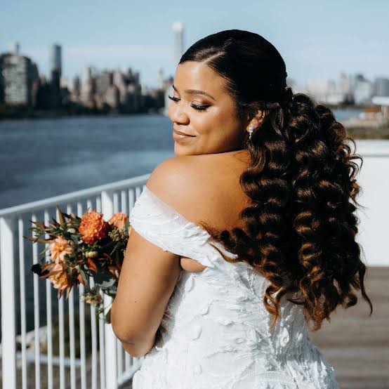 Elegant Updo With Swept Up Bangs Elegant Updo With Swept Up Bangs — Classy Curly Hair Cutting