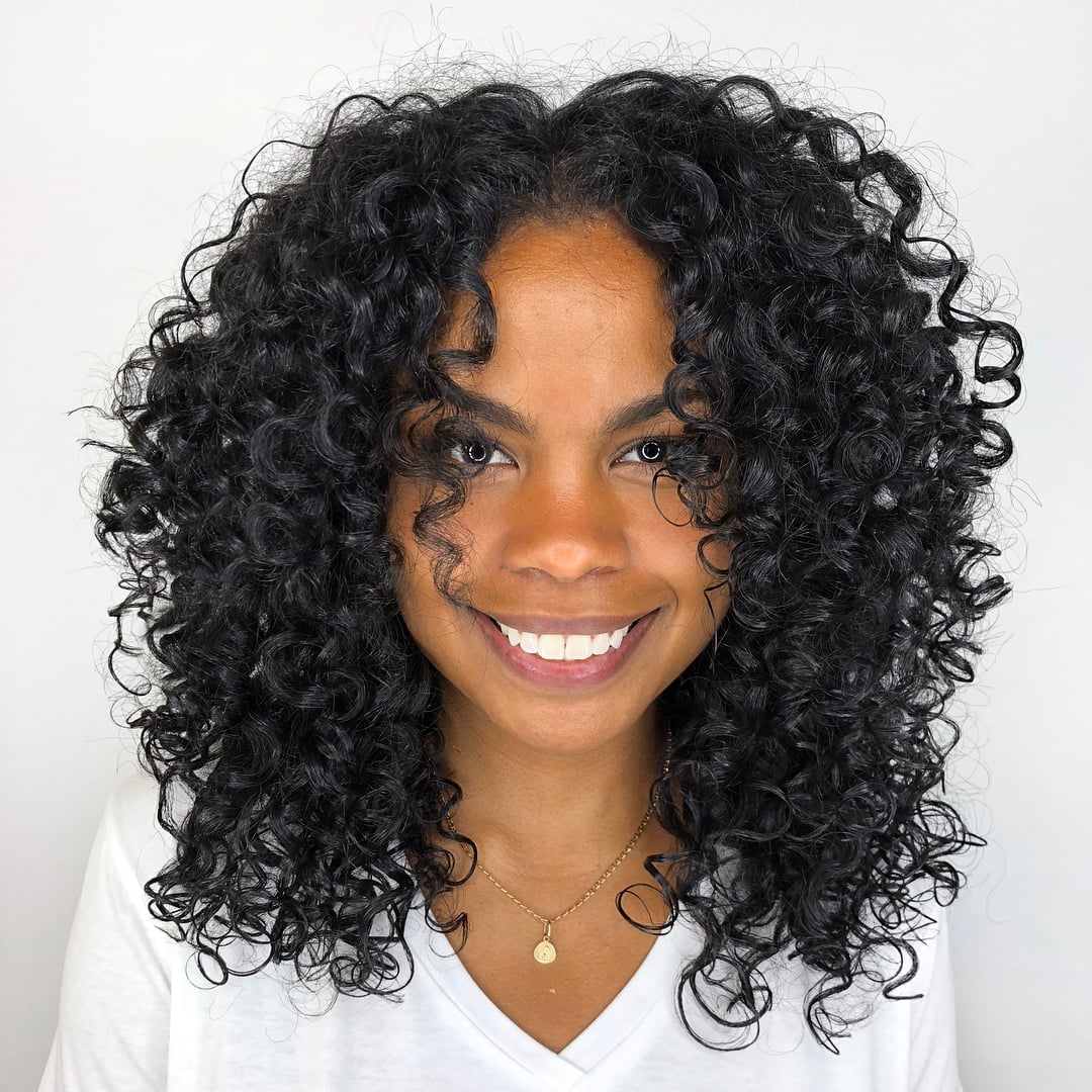 Collarbone Length With Face-Framing Curtain Bangs Collarbone Length With Face-Framing Curtain Bangs — Classy Curly Hair Layers