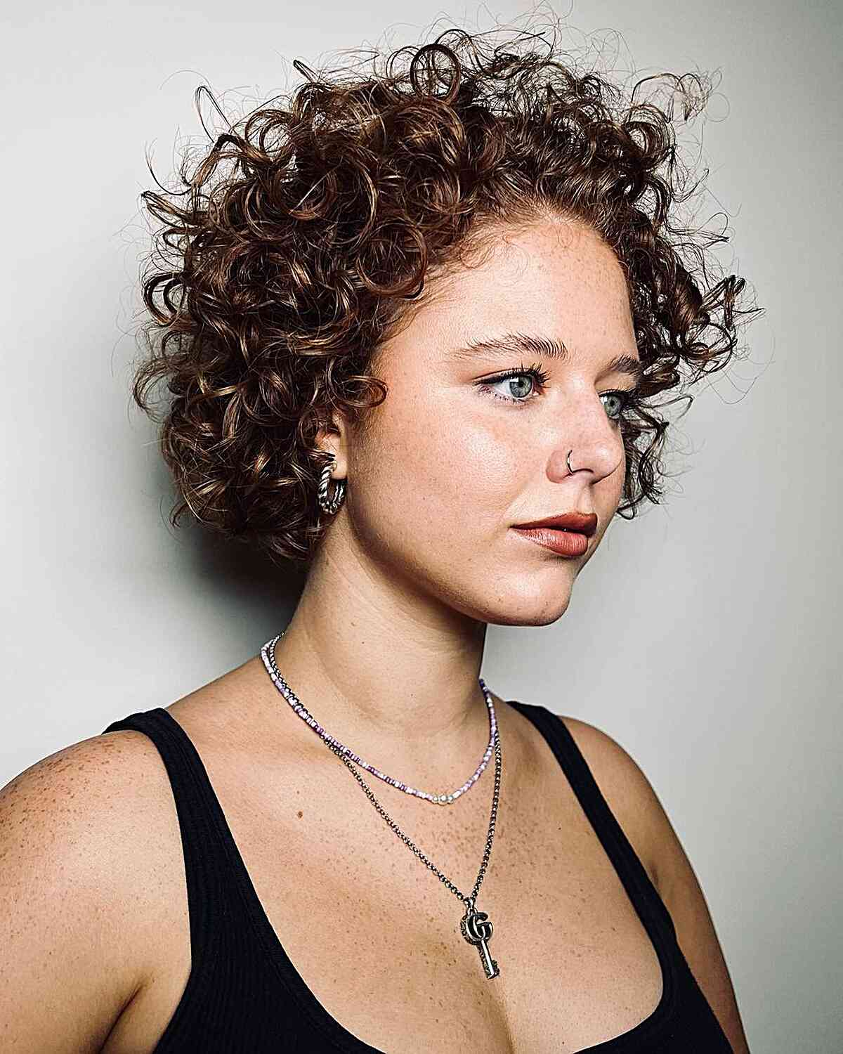 Short Bob With Auburn Highlights Short Bob With Auburn Highlights — Classy Curly Haircuts