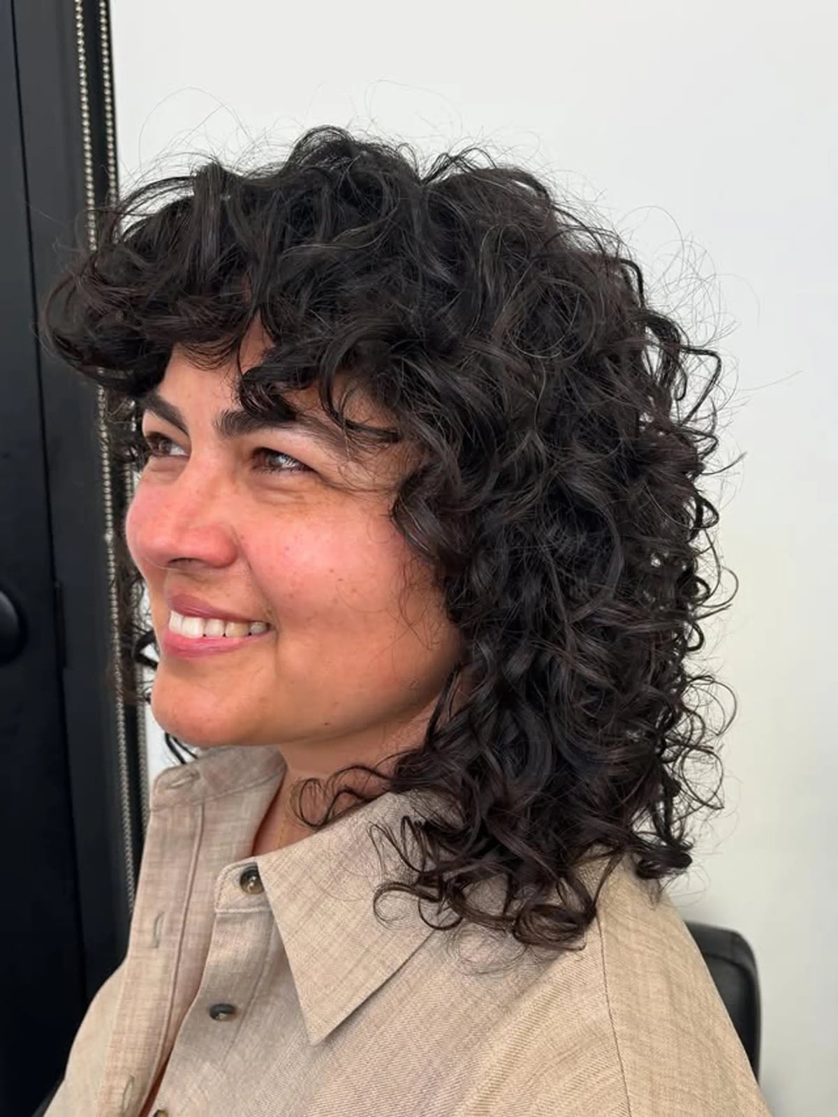 Collarbone Dark Brown Shag Side View Collarbone Dark Brown Shag Side View — Classy Curly Shag Haircut