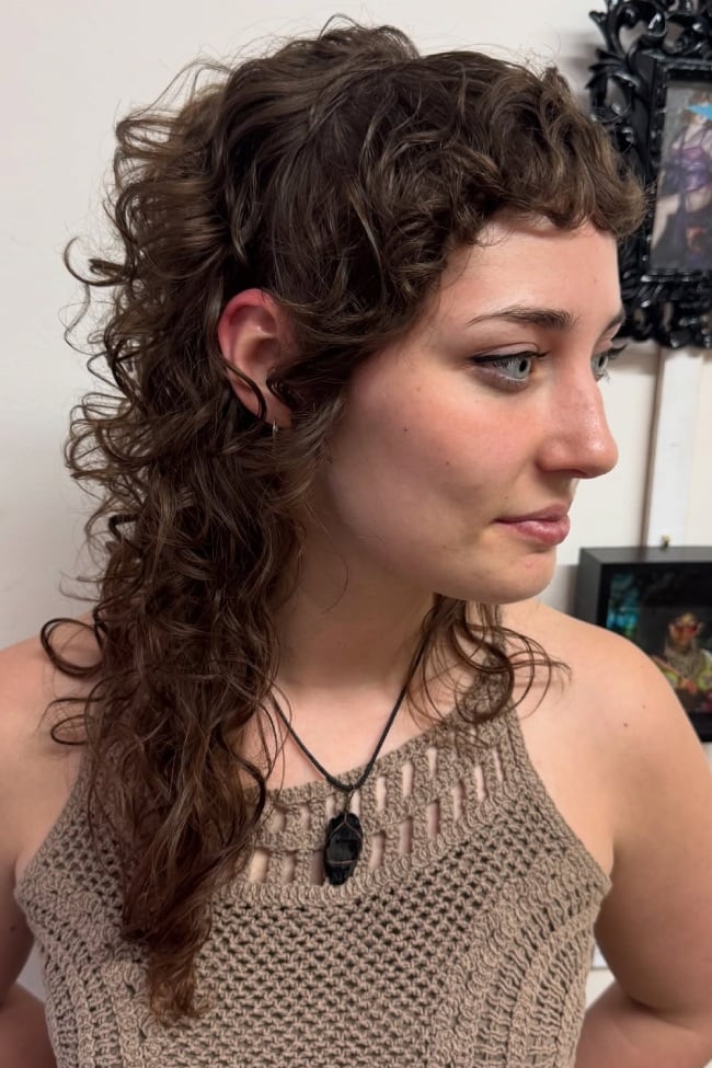 Collarbone Shag With Short Choppy Bangs Collarbone Shag With Short Choppy Bangs — Classy Curly Shag Haircut
