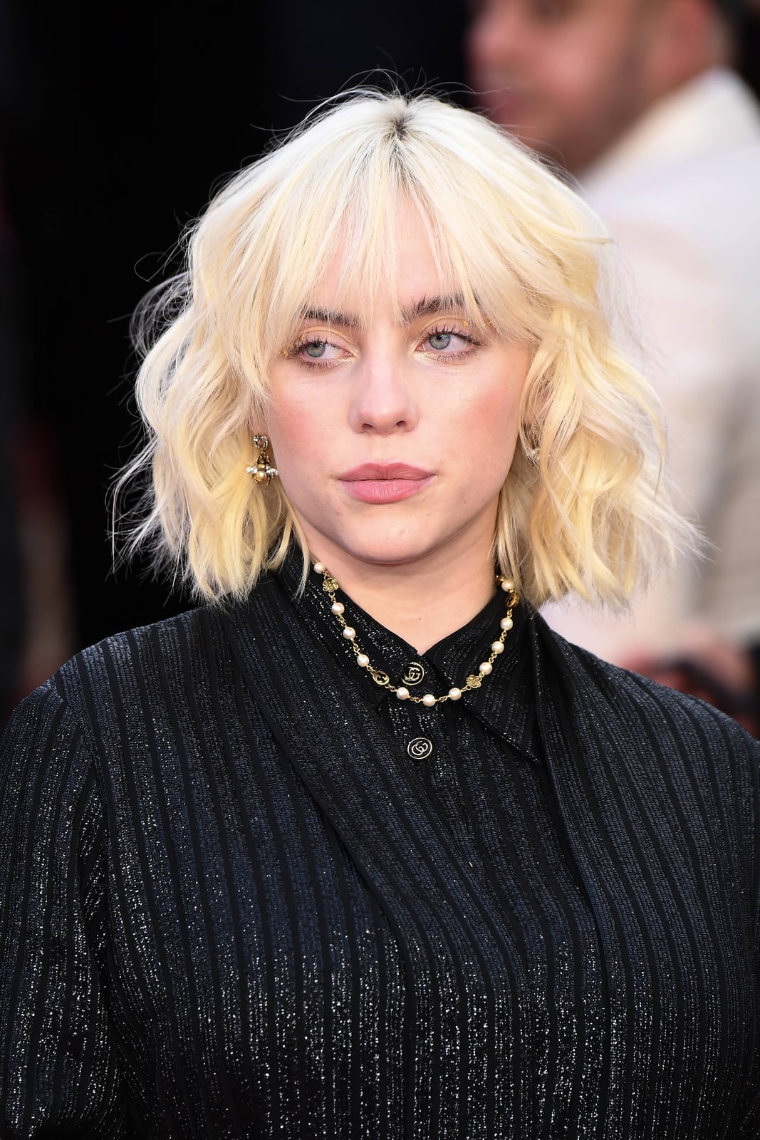 Ash Blonde Wavy Wolf Cut With Curtain Bangs Ash Blonde Wavy Wolf Cut With Curtain Bangs — Classy Curly Wolf Cut