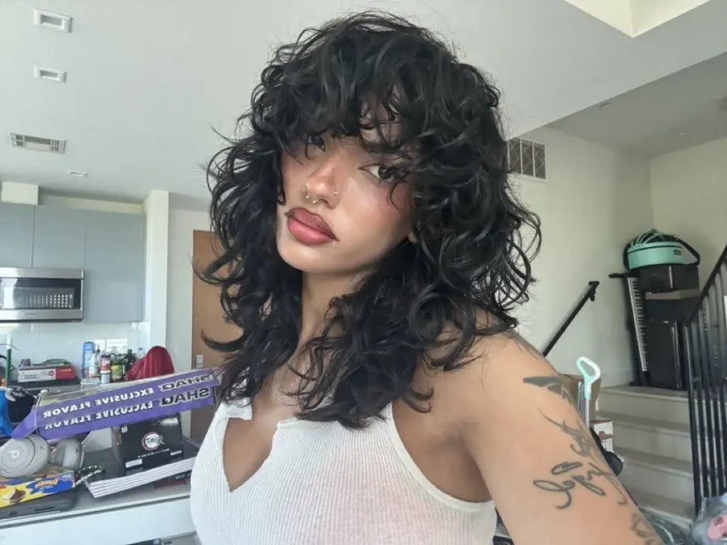 Black Curly Wolf Cut With Full Bangs Wet Look Black Curly Wolf Cut With Full Bangs Wet Look — Classy Curly Wolf Cut