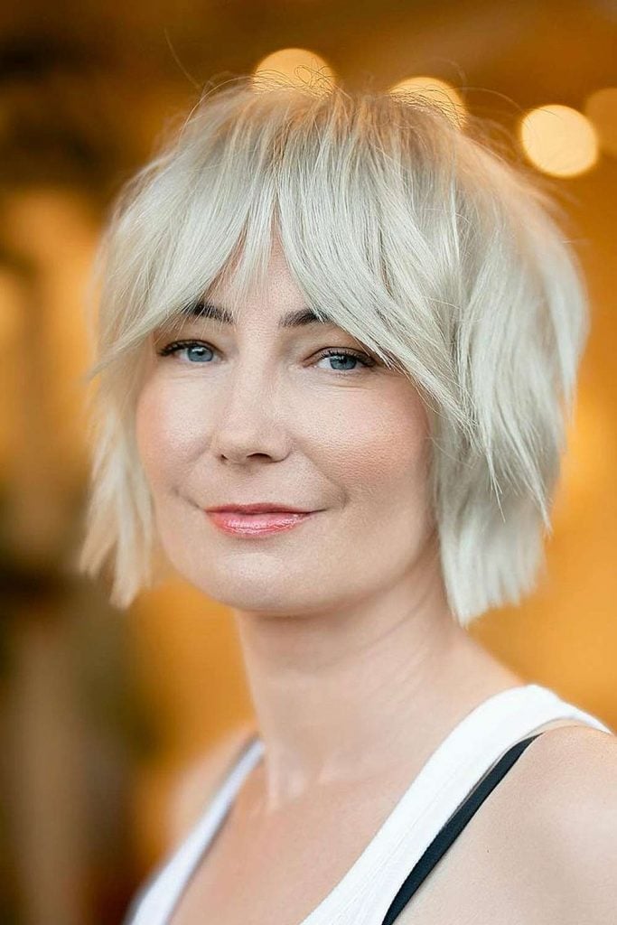 Ash Blonde Shag With Sweeping Curtain Bangs Ash Blonde Shag With Sweeping Curtain Bangs — Classy Curtain Bangs Short