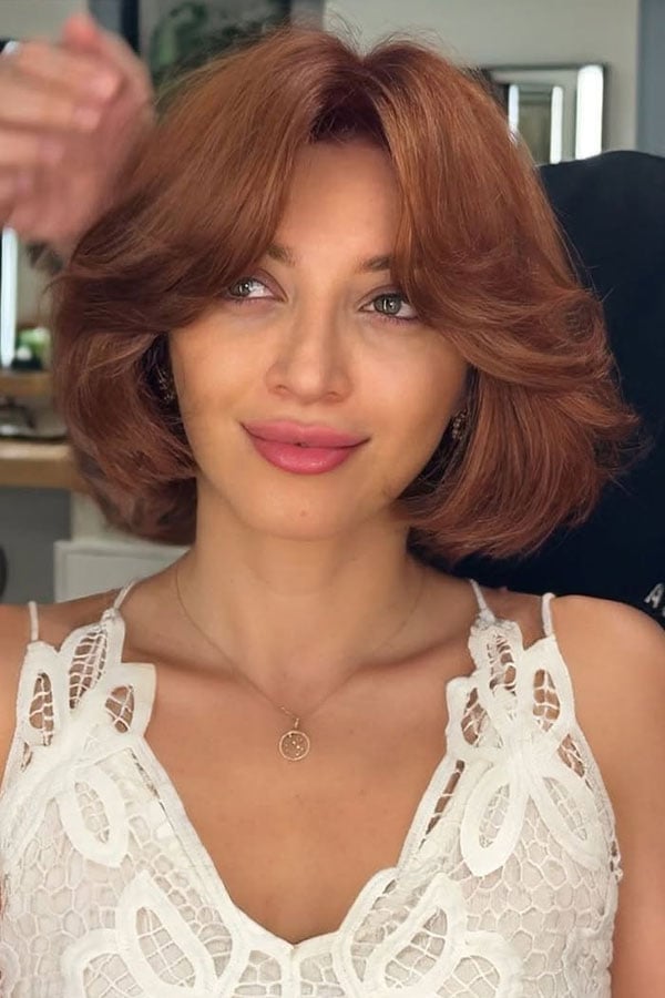 Vibrant Copper Bob With Side Swept Bangs Vibrant Copper Bob With Side Swept Bangs — Classy Curtain Bangs Short