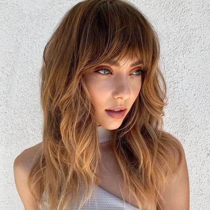 Collarbone Shag With Wispy Bangs Honey Blonde Collarbone Shag With Wispy Bangs Honey Blonde — Classy Cut Bangs