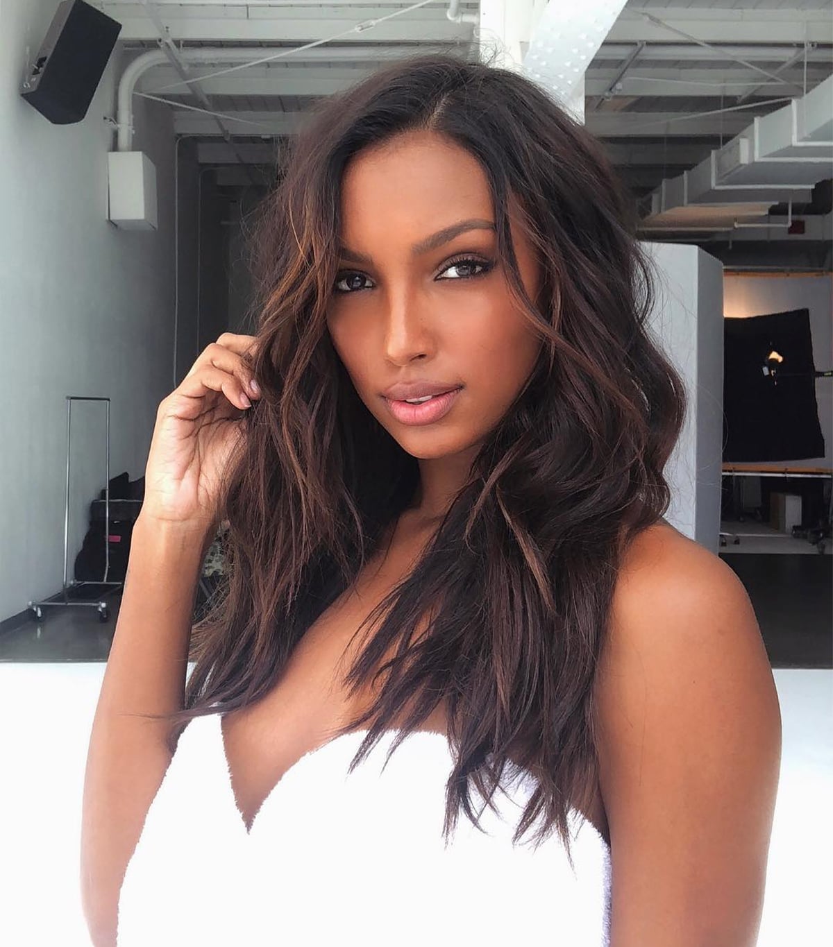 Mid-Back Dark Brown With Glossy Blowout and Curtain Bangs Mid-Back Dark Brown With Glossy Blowout and Curtain Bangs — Classy Dark Brown Hair with Caramel