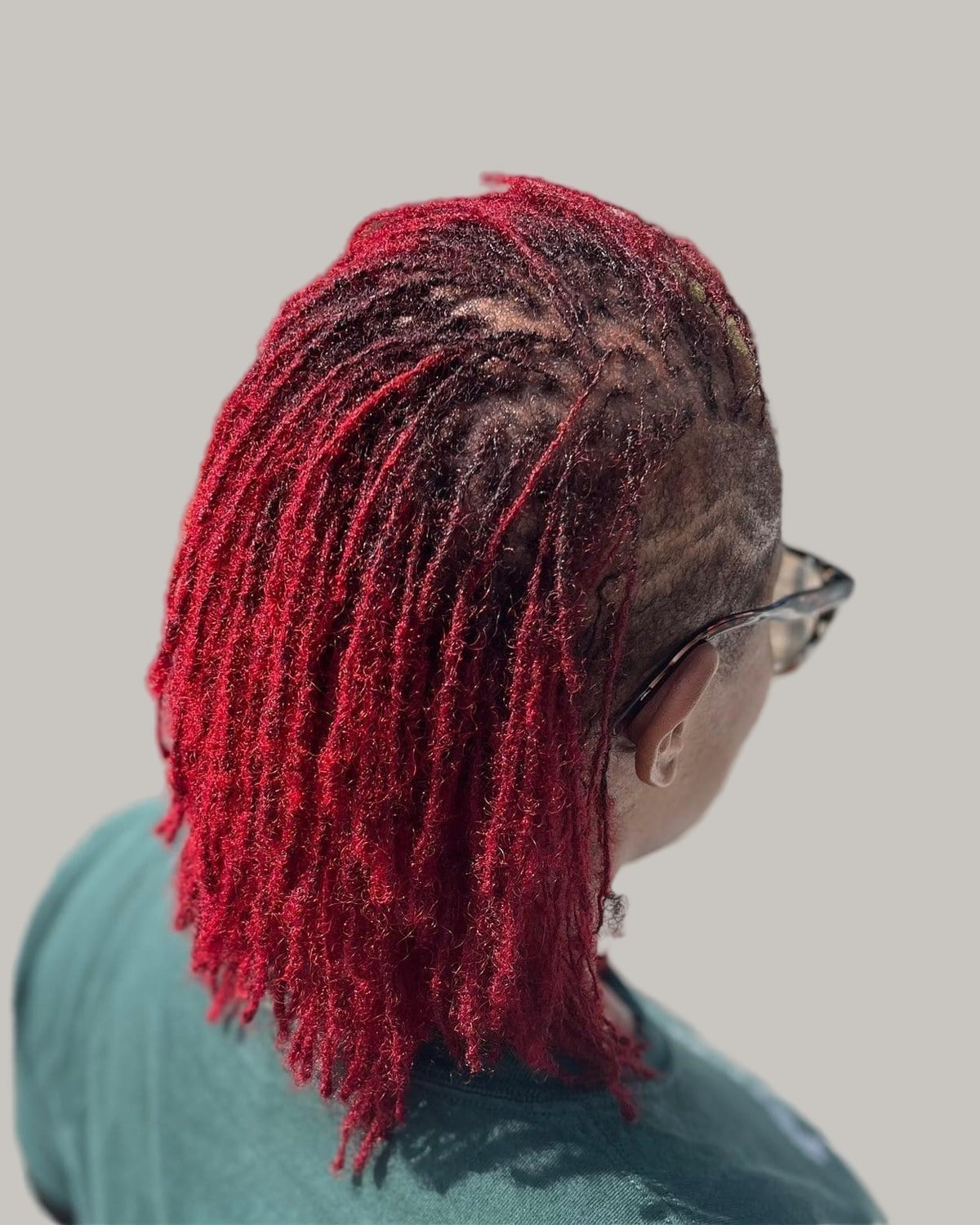 Short Locs In Vibrant Red With Showcasing The Striking Colour — Classy Dyed Locs