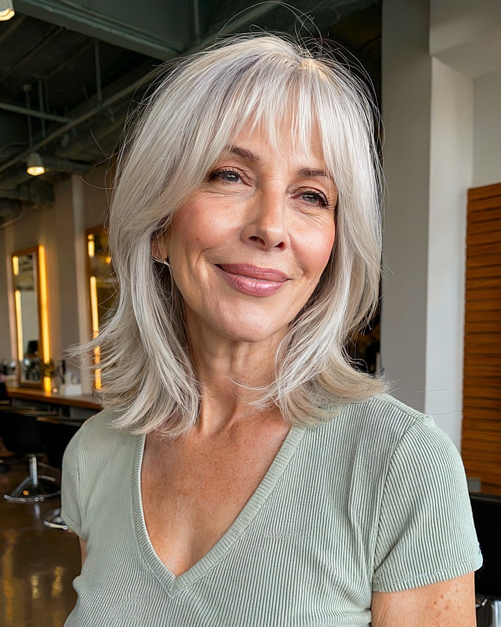 Silver Blonde Collarbone Lob With Wispy Bangs Silver Blonde Collarbone Lob With Wispy Bangs — Classy Face Framing Layers