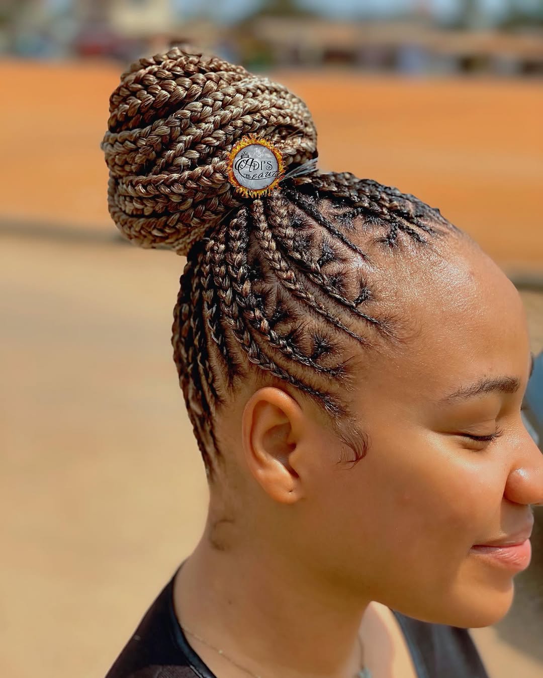 Cornrows into Braided Bun with Wavy Ends Cornrows into Braided Bun with Wavy Ends — Classy Feed in Braids