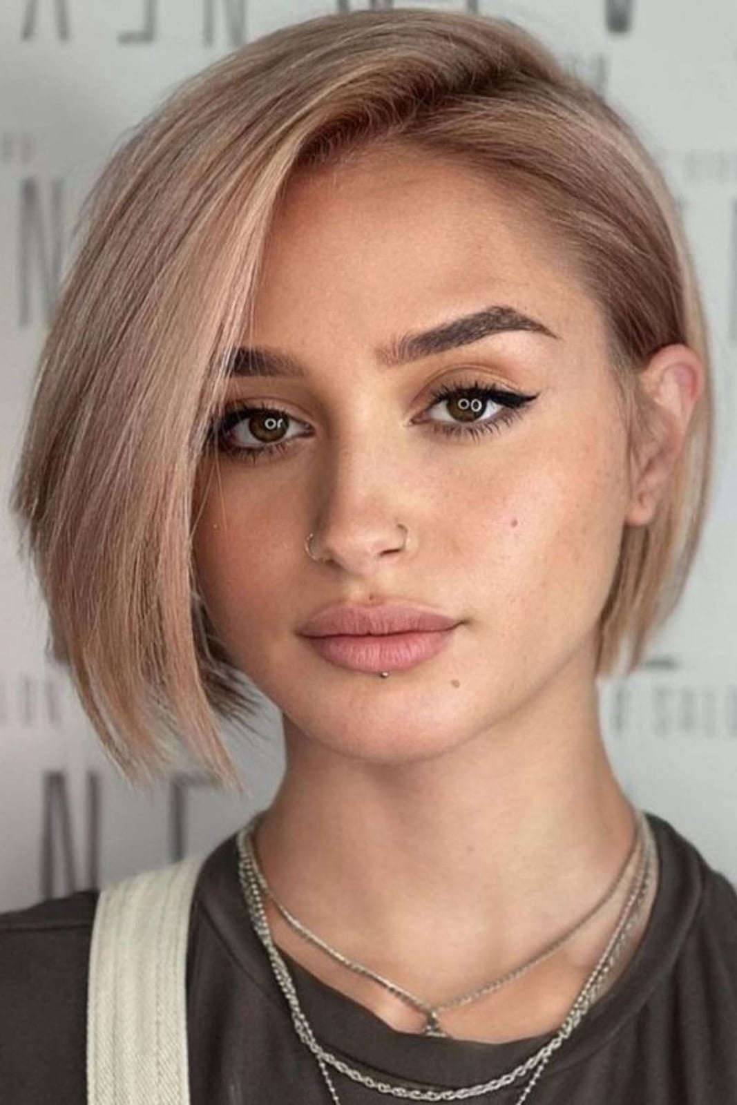 Sleek Black Bob With Blunt Bangs Sleek Black Bob With Blunt Bangs — Classy French Bob Haircut