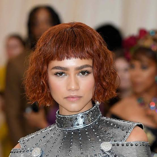 Dark Brown Bob With Side Swept Bangs Dark Brown Bob With Side Swept Bangs — Classy French Bob with Bangs