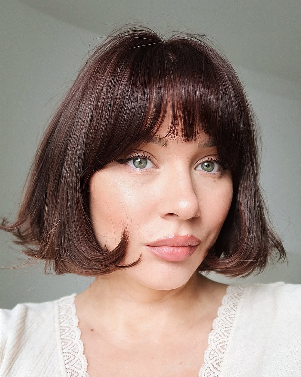 Textured Bob With Balayage Dimension Textured Bob With Balayage Dimension — Classy French Bob with Bangs
