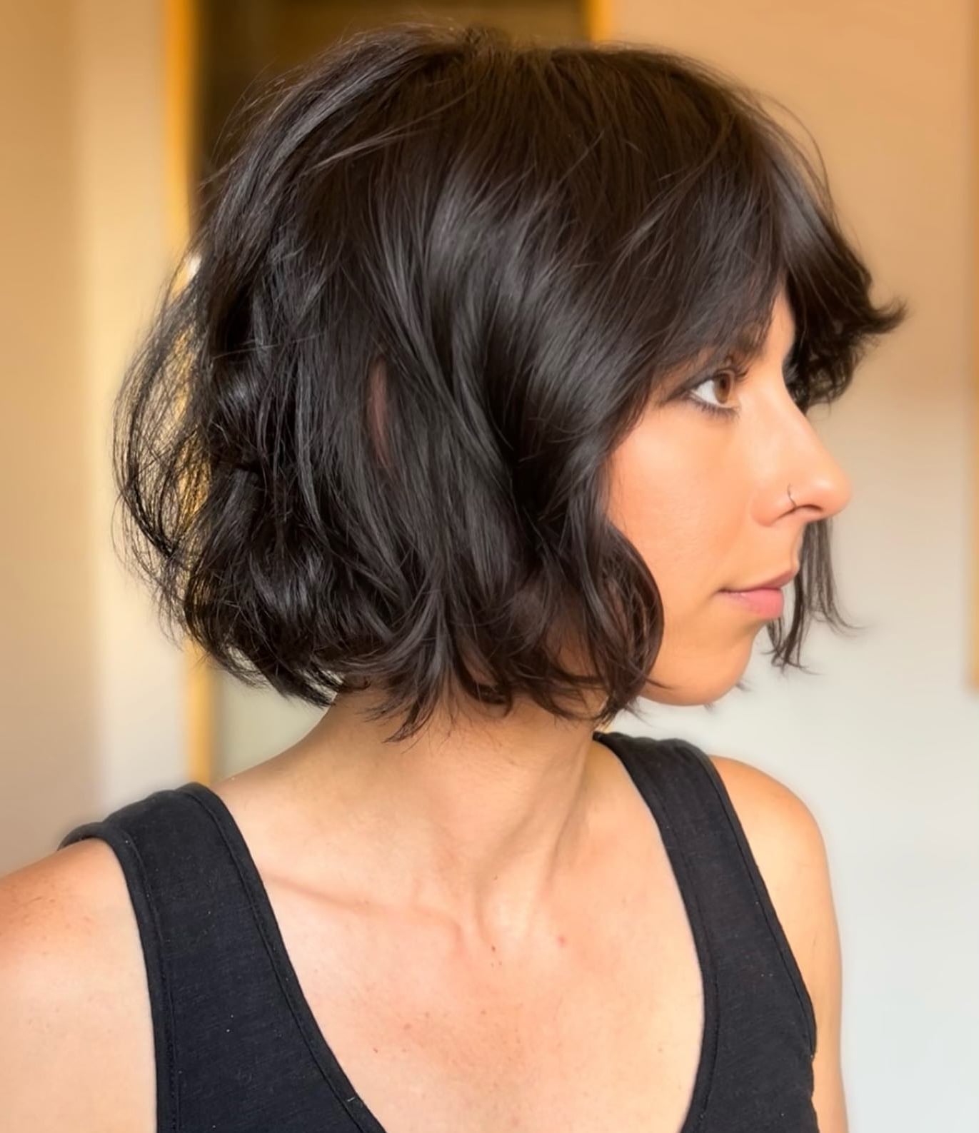Dark Brown Textured Bob Side View Dark Brown Textured Bob Side View — Classy French Bob with Bangs
