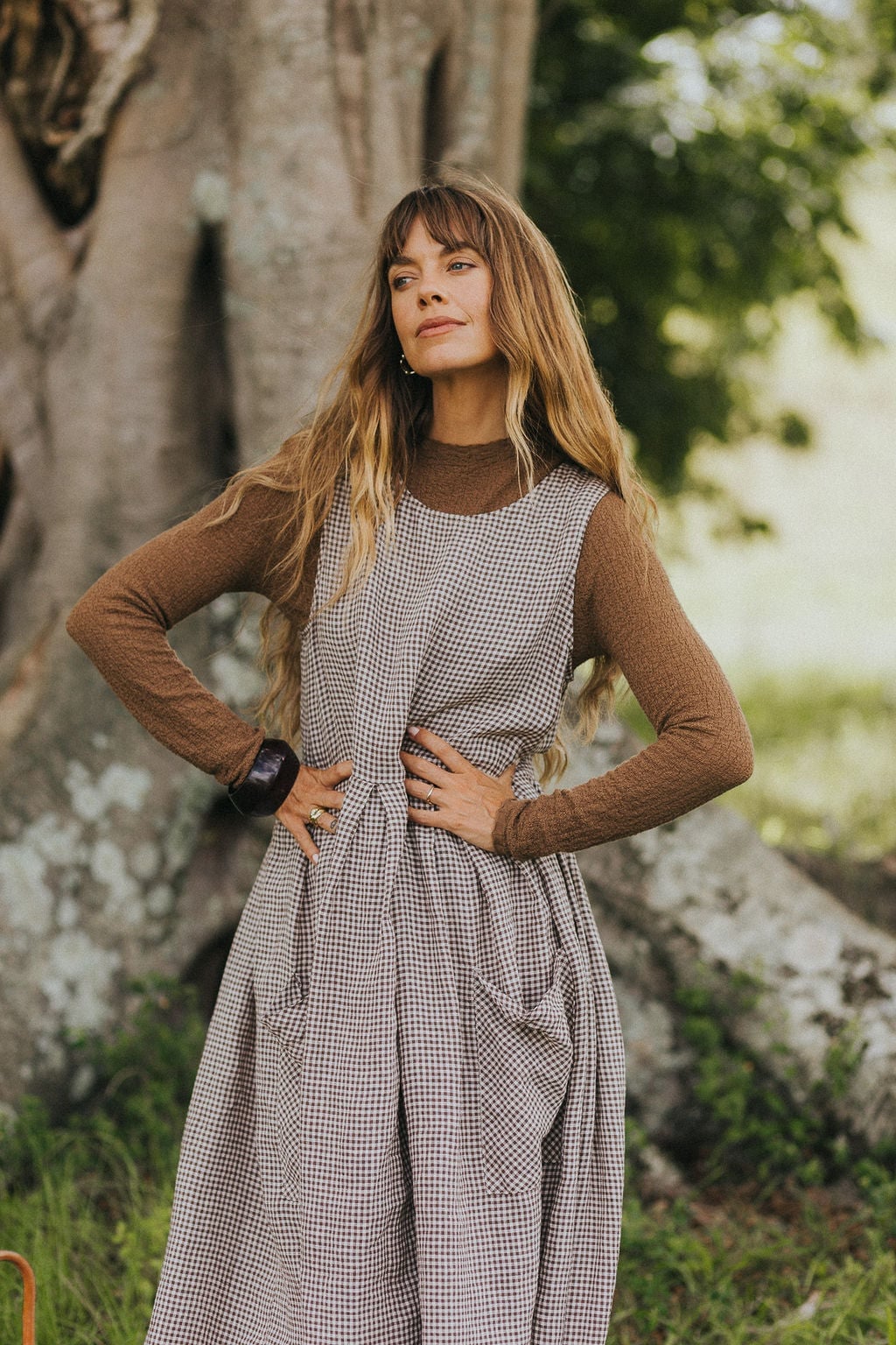 Brown and White Gingham Pinafore Dress Layered Over a Knit Top Brown and White Gingham Pinafore Dress Layered Over a Knit Top — Classy Gingham Dress