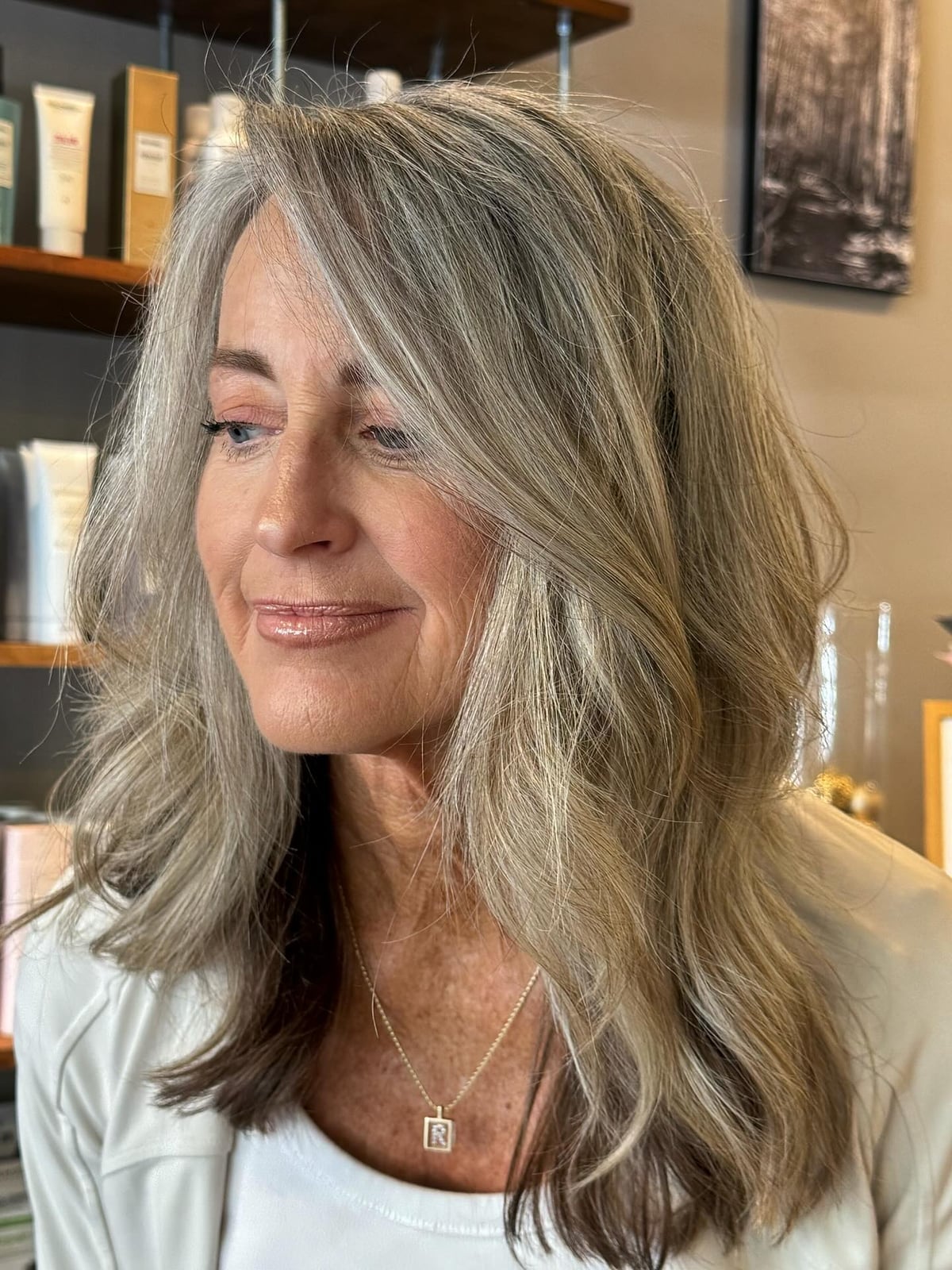 Collarbone Layers With Side-Swept Bangs Collarbone Layers With Side-Swept Bangs — Classy Gray Blending Hair