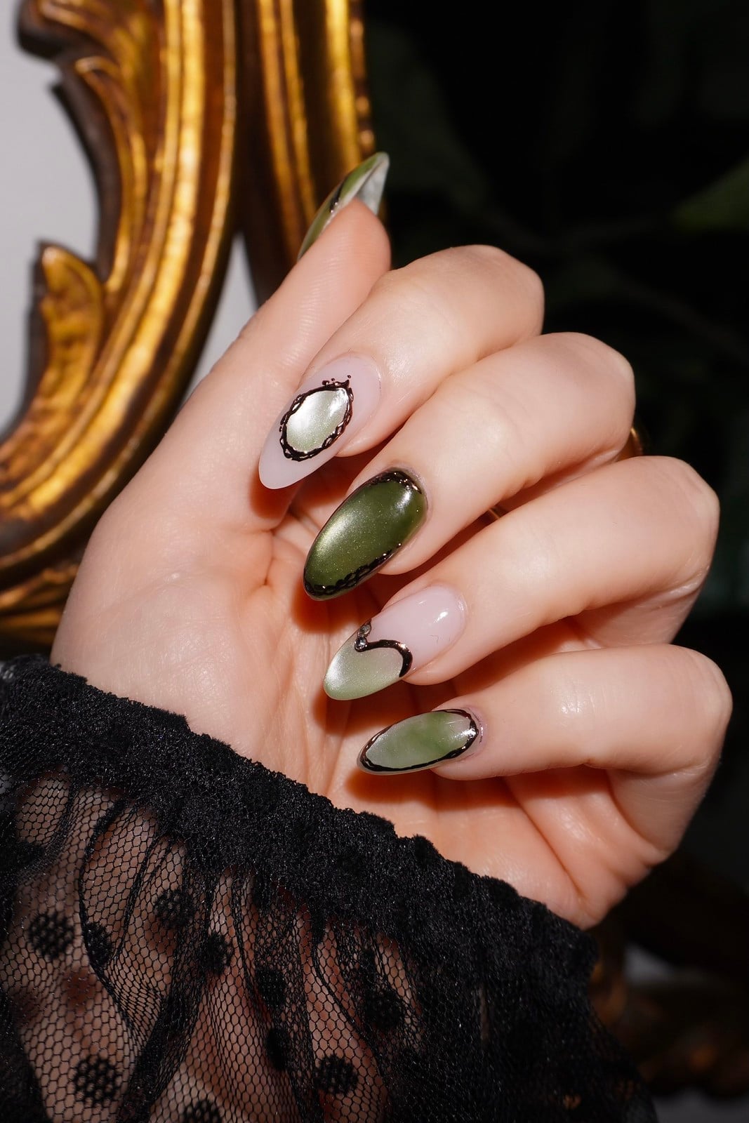 Green Cat Eye with Black Accents Medium Almond Nails — Classy Green Cat Eye Nails