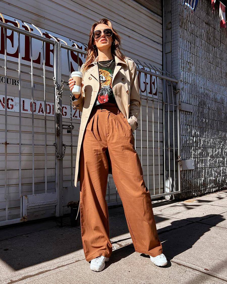 Beige Trench Coat Over Graphic Tee With Wide Trousers Beige Trench Coat Over Graphic Tee With Wide Trousers — Classy Grunge Style