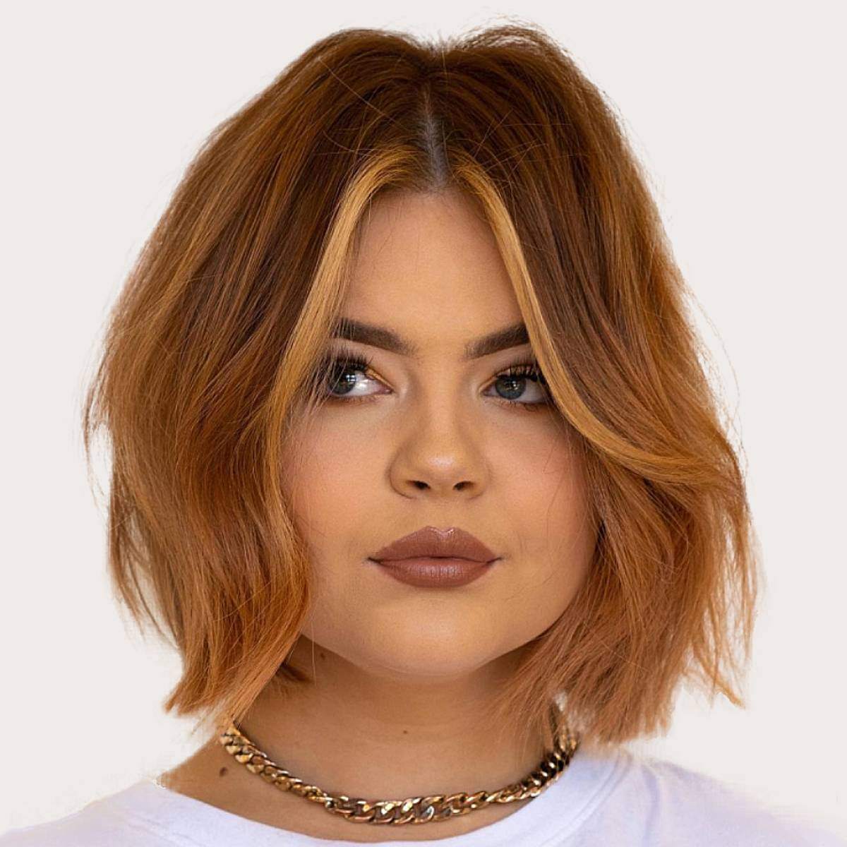 Chin Length Angled Bob With Money Piece Chin Length Angled Bob With Money Piece — Classy Hair for Round Face